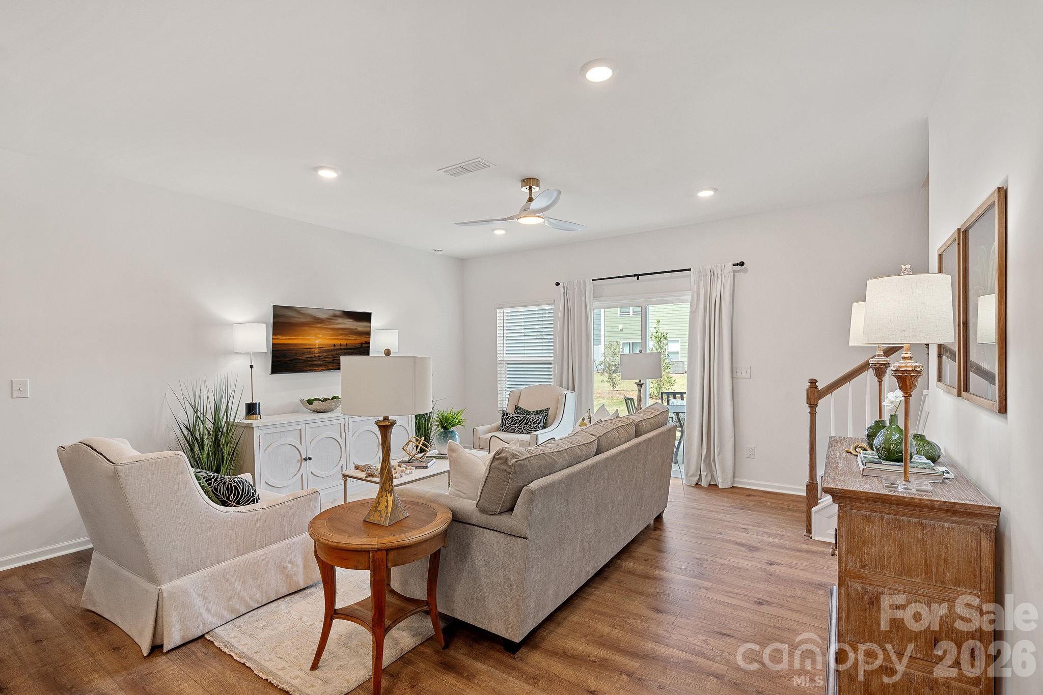 3579 Nimbell Road Monroe, NC 28110 - Photo 12 of 24 a living room with furniture and a wooden floor
