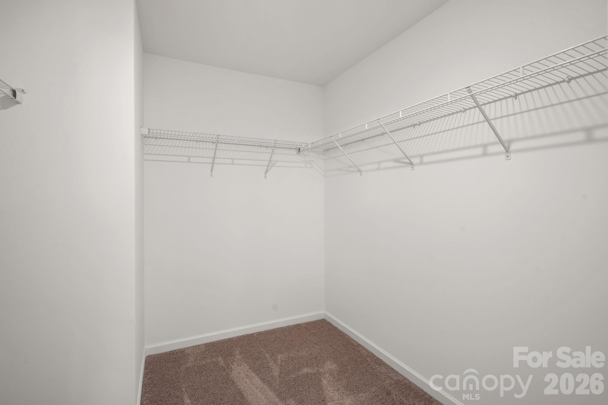 3579 Nimbell Road Monroe, NC 28110 - Photo 17 of 24 a view of a room with racks on the wall