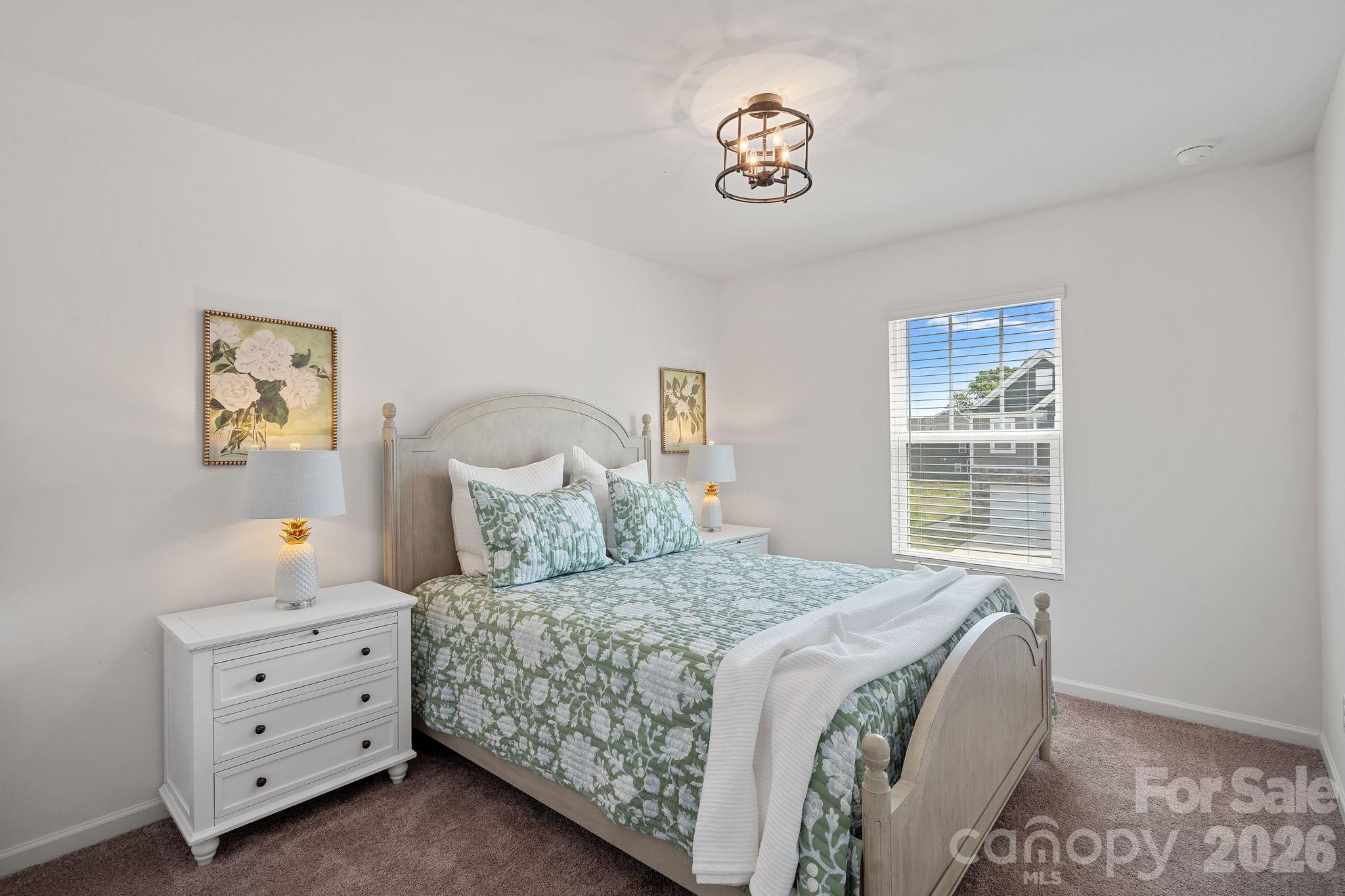 3579 Nimbell Road Monroe, NC 28110 - Photo 19 of 24 a bedroom with a bed and a window