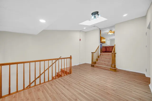 a view of entryway with wooden floor