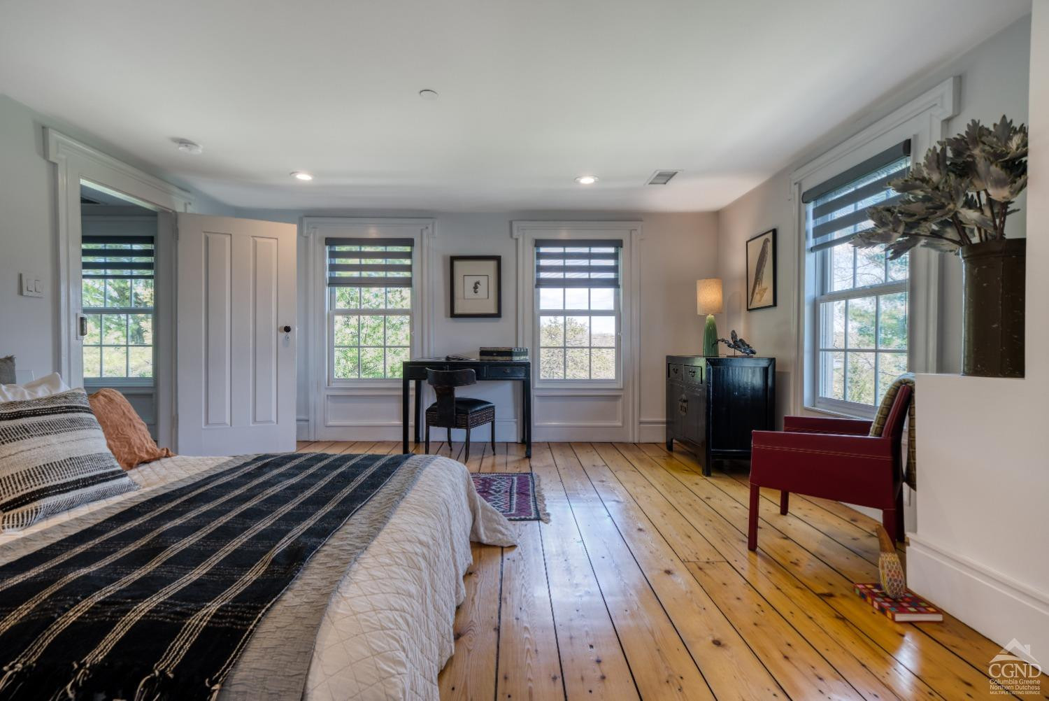 261 Kipp Road Hudson, NY 12534 - Photo 11 of 36 a living room with furniture and a wooden floor