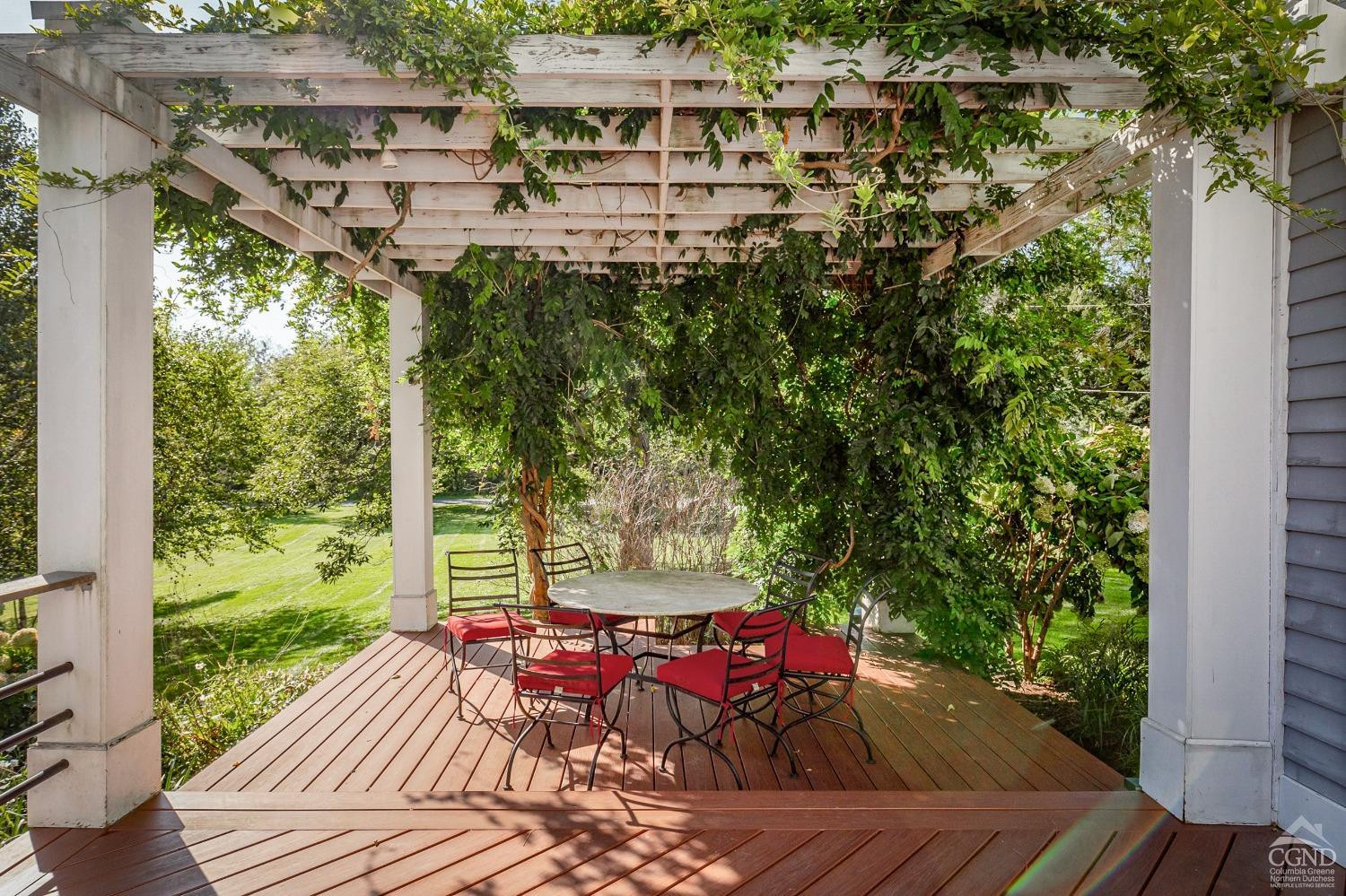 261 Kipp Road Hudson, NY 12534 - Photo 15 of 36 a view of balcony with wooden floor and outdoor seating