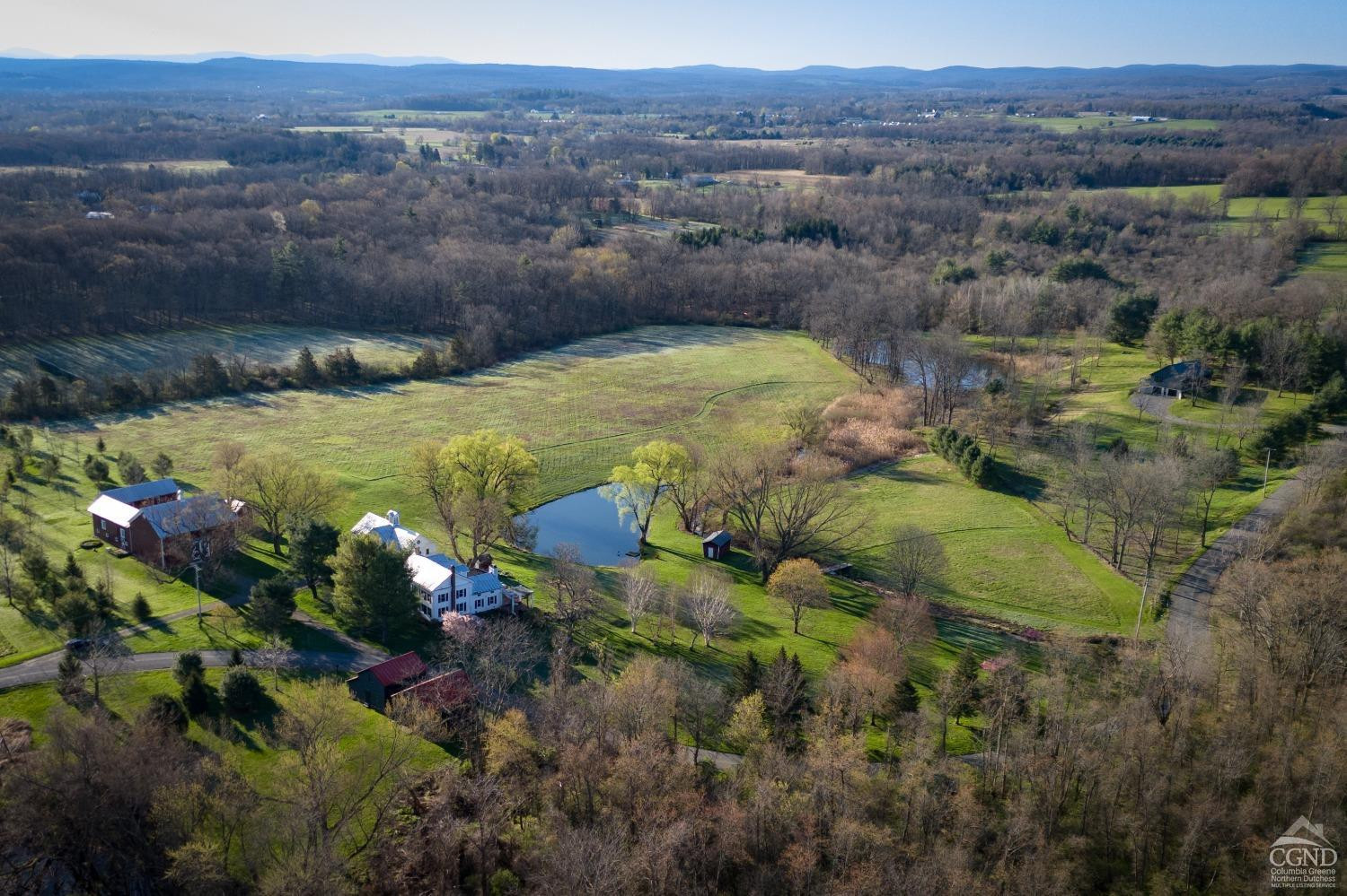 261 Kipp Road Hudson, NY 12534 - Photo 2 of 36 a view of a lake with mountains in the background