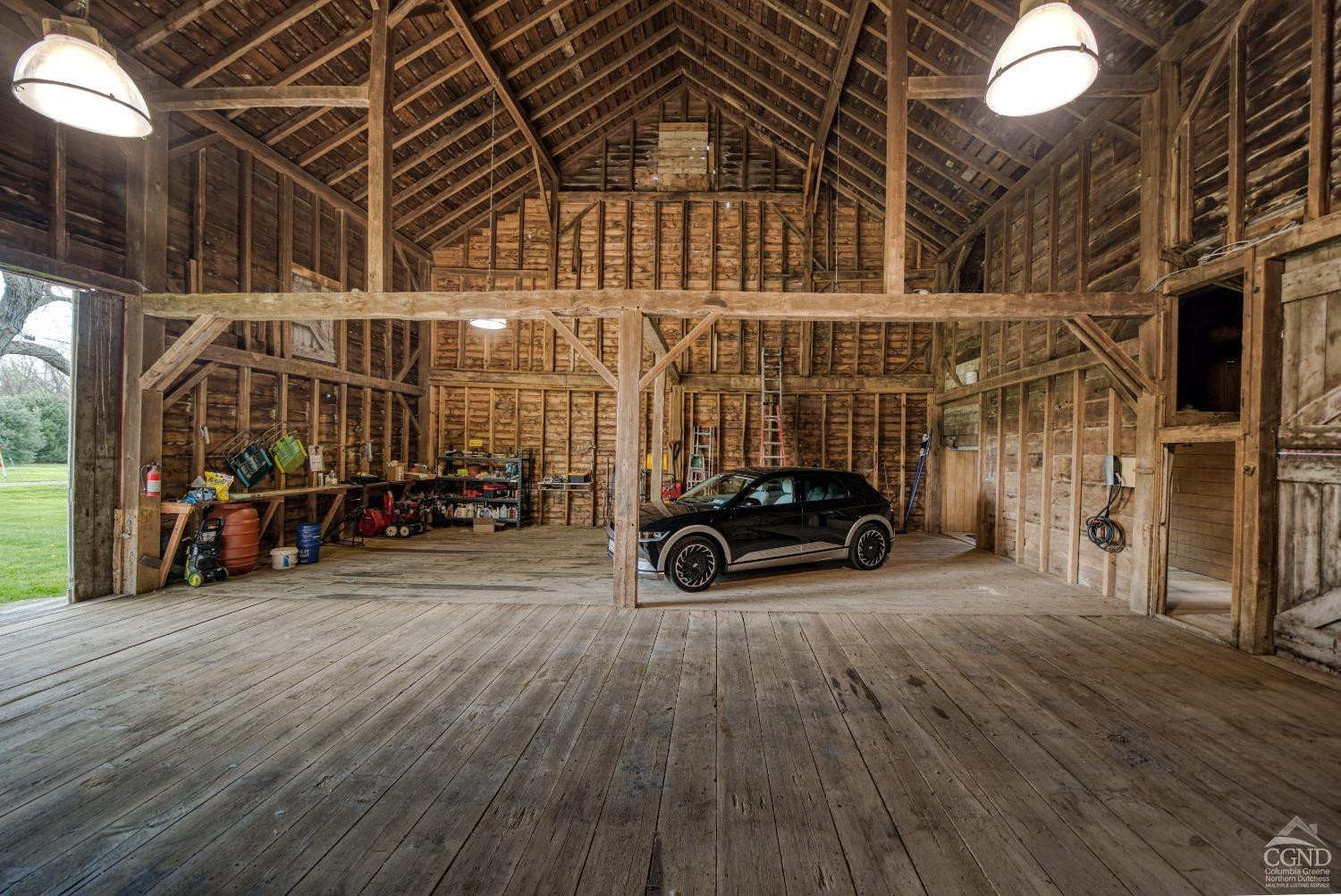 261 Kipp Road Hudson, NY 12534 - Photo 30 of 36 a view of a big room with wooden floor