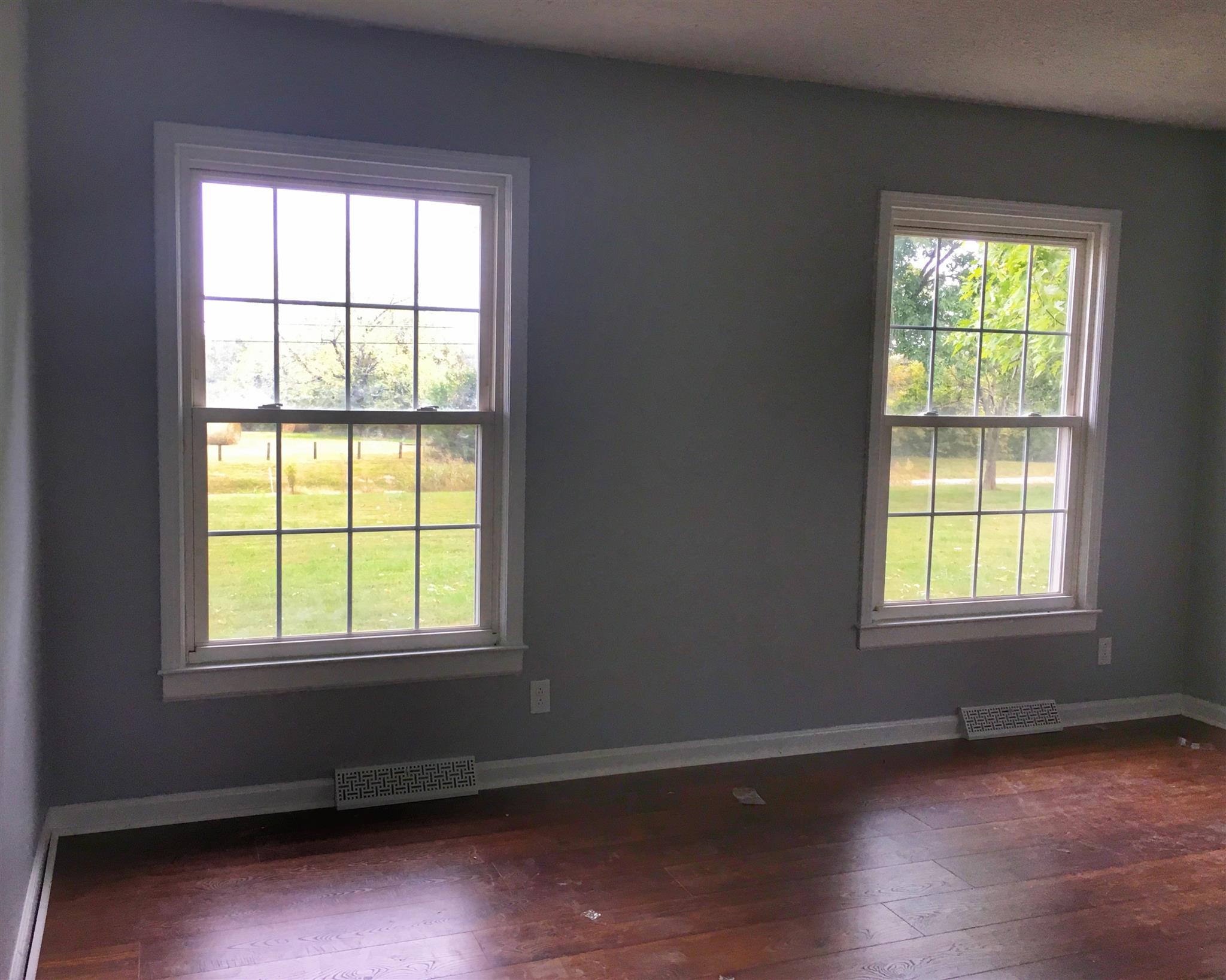 1526 Murfreesboro Road Lebanon, TN 37090 - Photo 8 of 11 The large bedrooms all feature gorgeous new floors and fresh paint, but that's only half the story... Look at those country views!