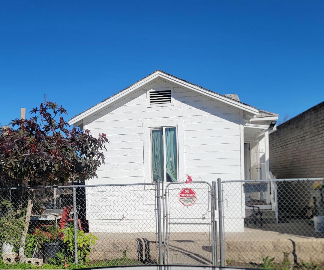 a front view of a house with a garage