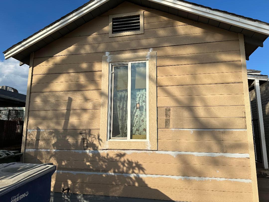 148 E Street Fresno, CA 93706 - Photo 11 of 13 a front view of a house