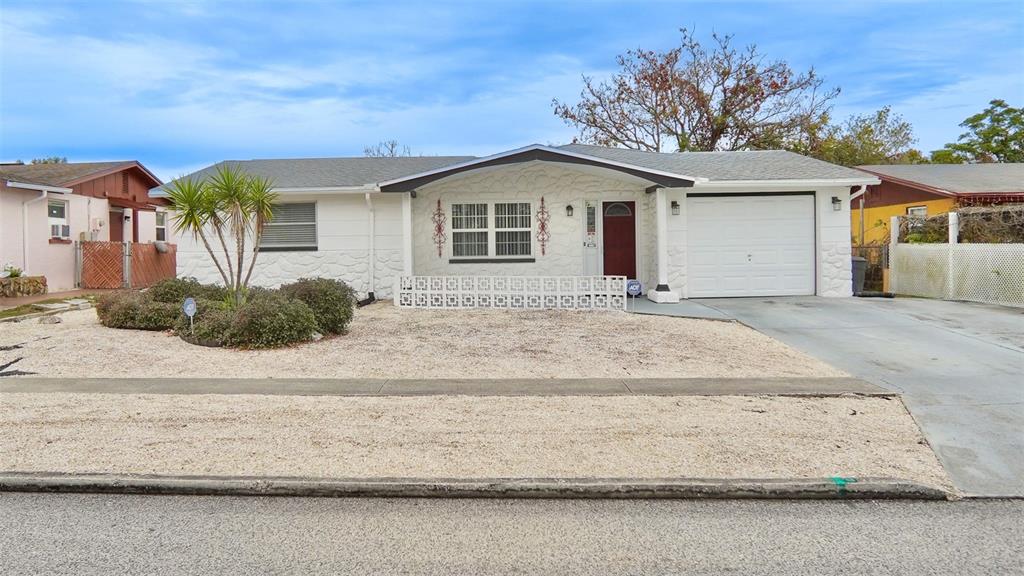6153 9th Avenue New Port Richey, FL 34653 - Photo 1 of 1 a house with a outdoor space