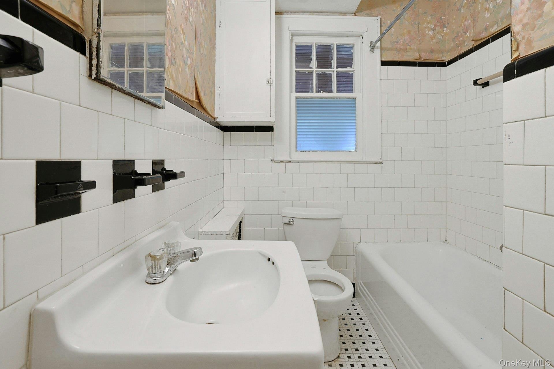 333 South Middletown Road Nanuet, NY 10954 - Photo 17 of 22 a bathroom with a sink a toilet and bathtub
