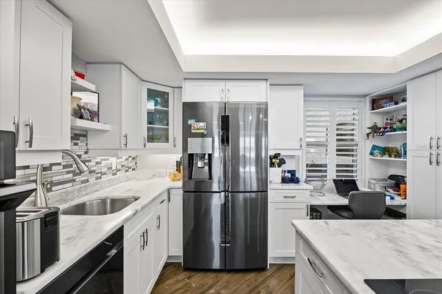view of living room with furniture and book shelf