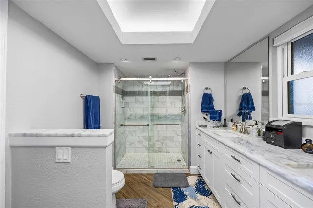 a bed room with a bed and a window