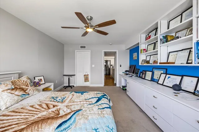 a bed room with a bed and a window