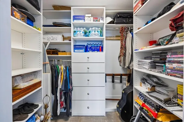 a bathroom with a double vanity sink and mirror