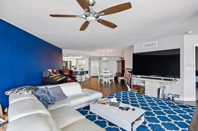 a living room with furniture and a rug