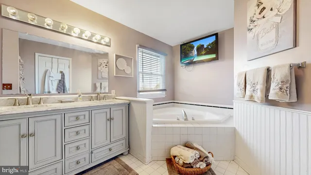 a view of a swimming pool with a lounge chair