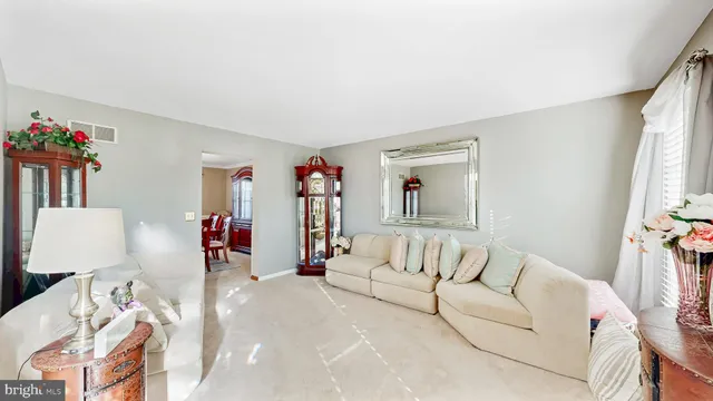 a bed room with a bed a desk and a book shelf