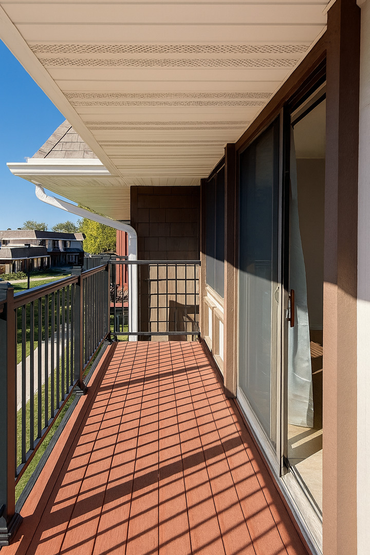 1272 Court, Unit E Hanover Park, IL 60133 - Photo 11 of 13 a view of balcony with wooden floor