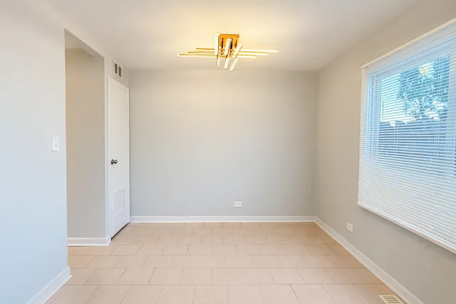 a view of a room with a window