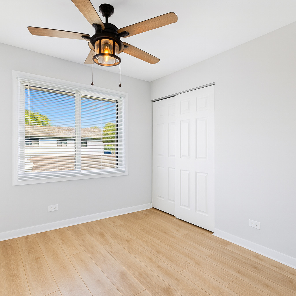 1272 Court, Unit E Hanover Park, IL 60133 - Photo 9 of 13 a view of an empty room with a window