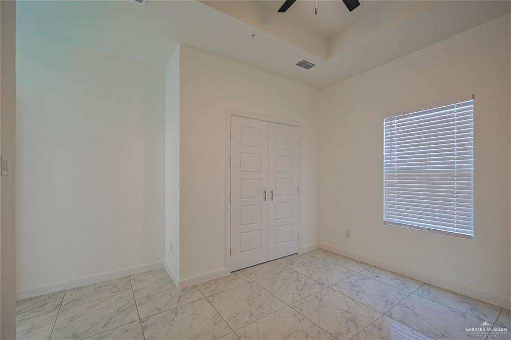 5325 Vision Street, Unit A Rio Grande City, TX 78582 - Photo 7 of 8 a view of an empty room with a window