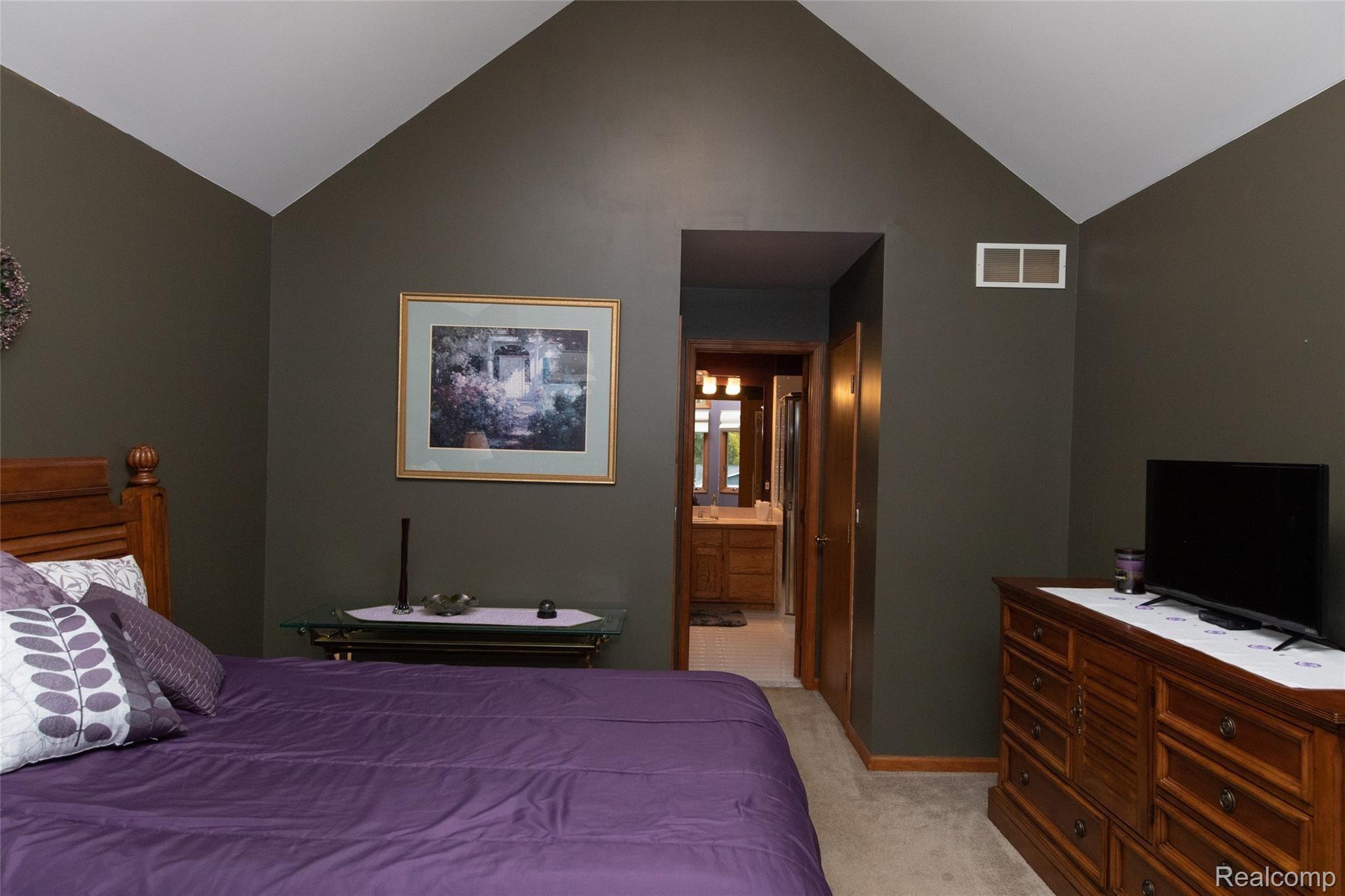 8652 Miller Road Clarkston, MI 48348 - Photo 26 of 47 Cathedral Ceiling with ceiling fan