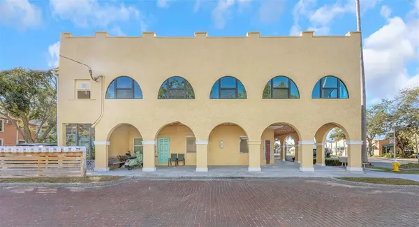 a view of front door and small yard