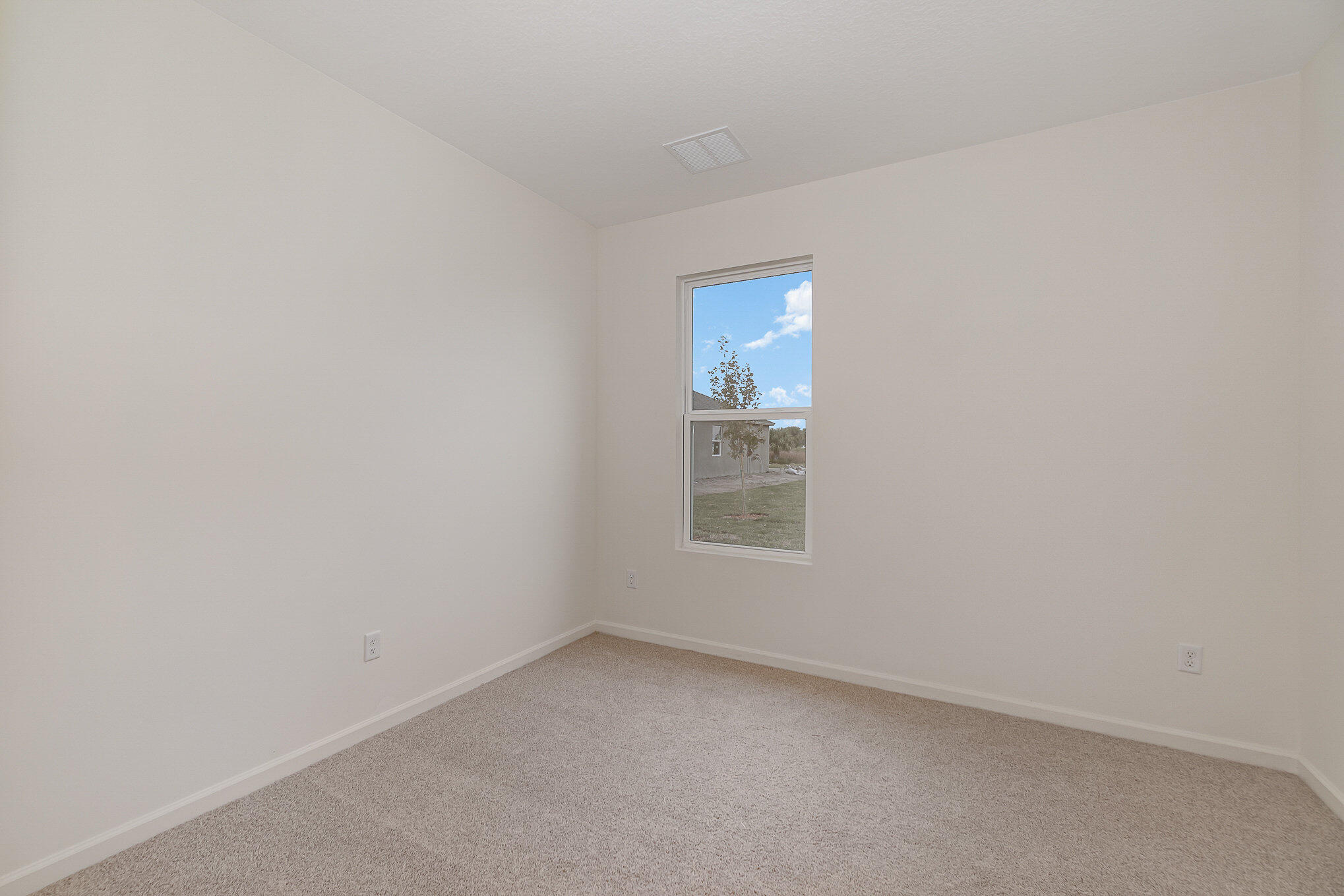 4842 Alabaster Drive Grant, FL 32949 - Photo 14 of 47 a view of an empty room with a window