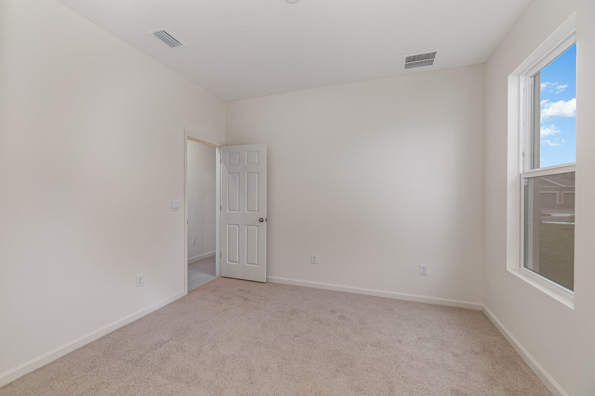4842 Alabaster Drive Grant, FL 32949 - Photo 15 of 47 a view of an empty room and a window