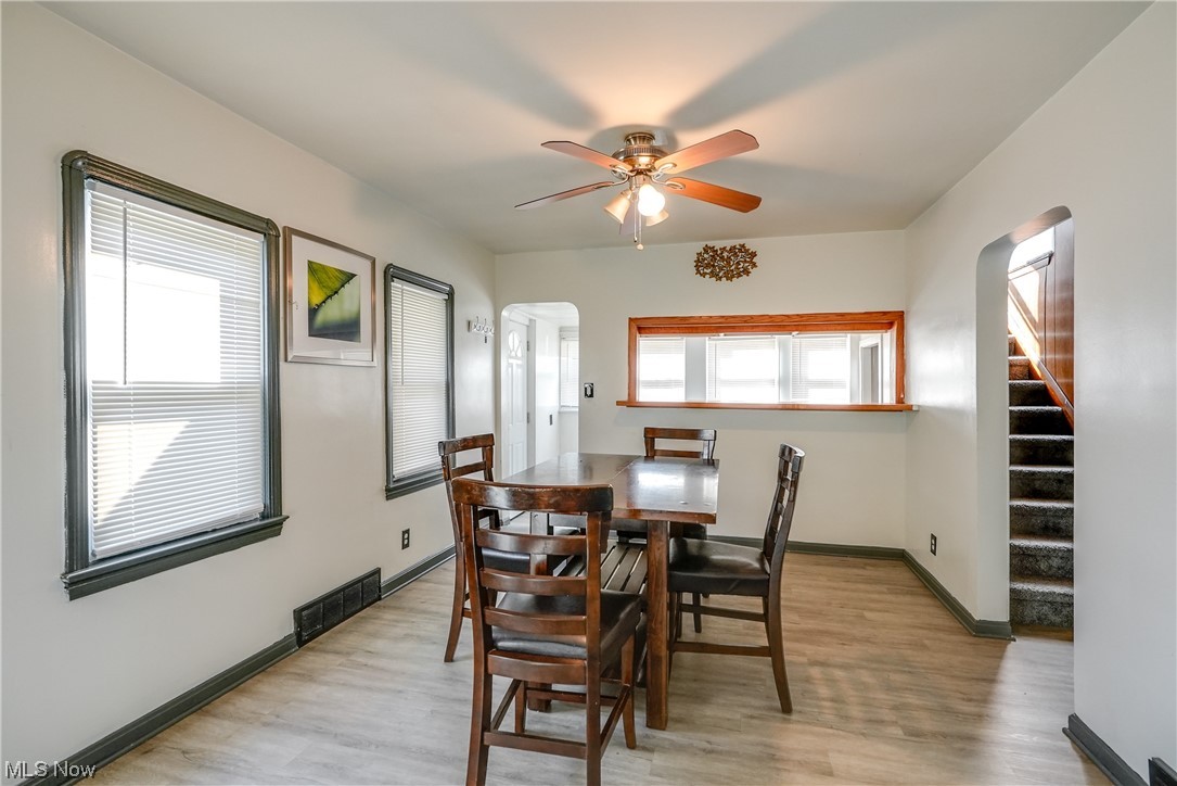4613 Snow Road Cleveland, OH 44134 - Photo 13 of 33 Wood floored dining space with ceiling fan