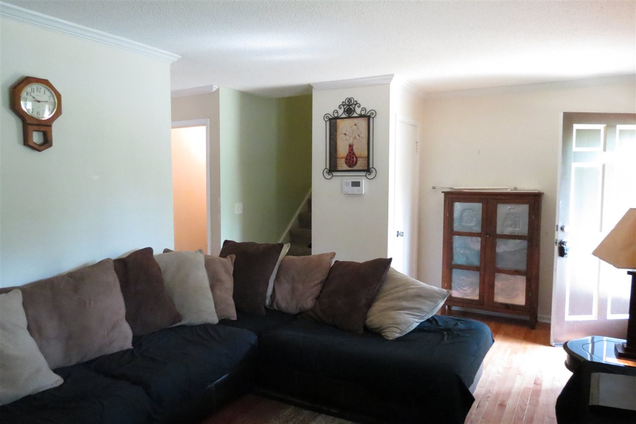 5114 McCormick Road Durham, NC 27713 - Photo 15 of 25 a living room with furniture and a window