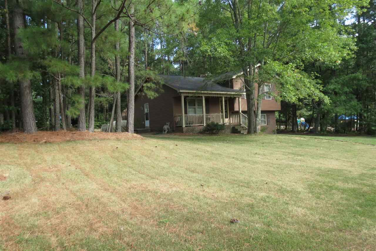 5114 McCormick Road Durham, NC 27713 - Photo 2 of 25 a front view of a house with a yard