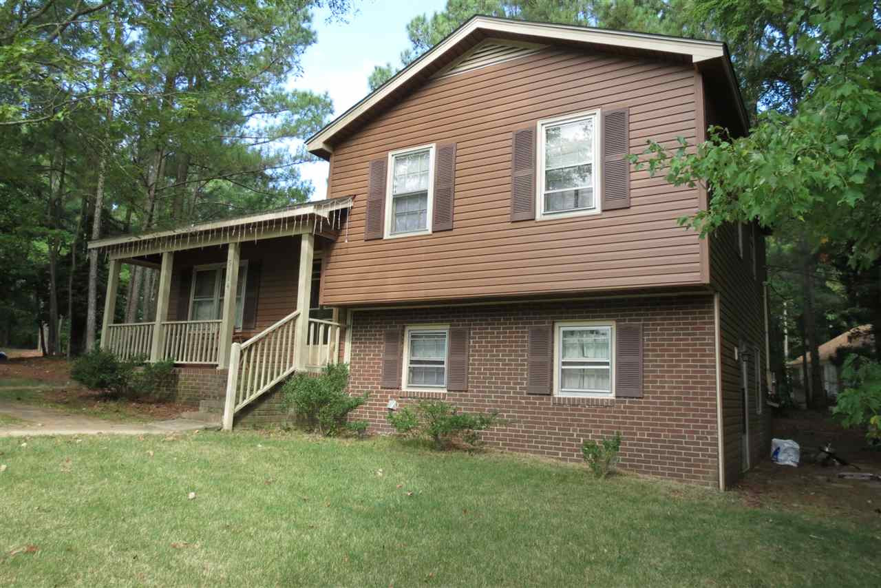 5114 McCormick Road Durham, NC 27713 - Photo 3 of 25 a front view of a house with garden