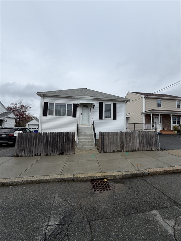 496 Tucker Street Fall River, MA 02721 - Photo 1 of 19 a view of a house with a patio