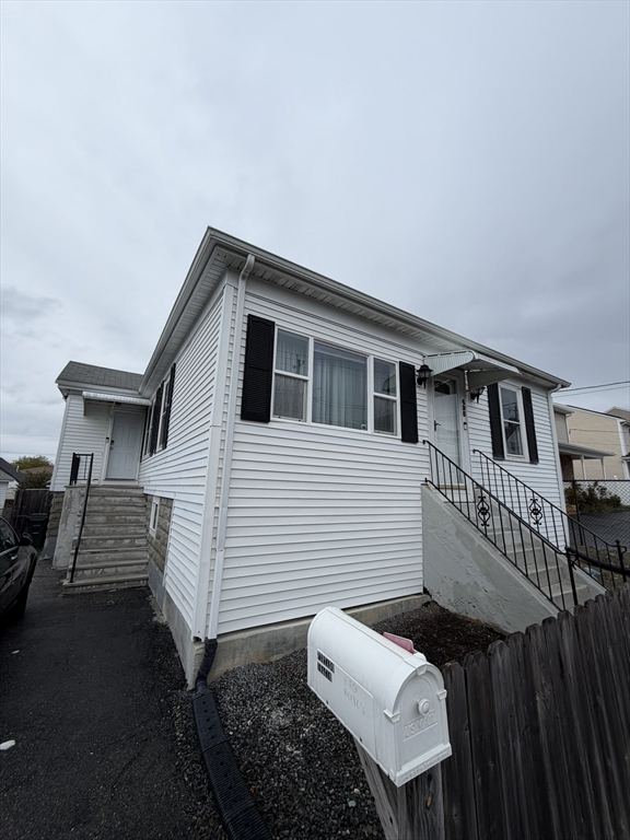 496 Tucker Street Fall River, MA 02721 - Photo 16 of 19 a view of a house with backyard and sitting area