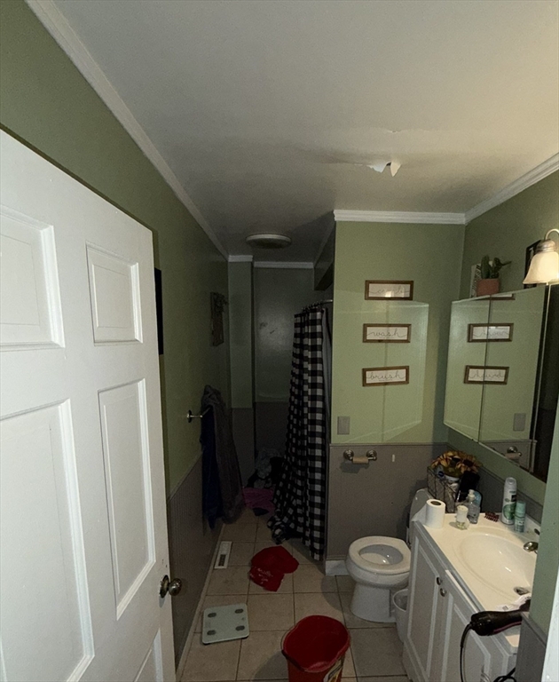 496 Tucker Street Fall River, MA 02721 - Photo 3 of 19 a bathroom with a sink toilet and shower