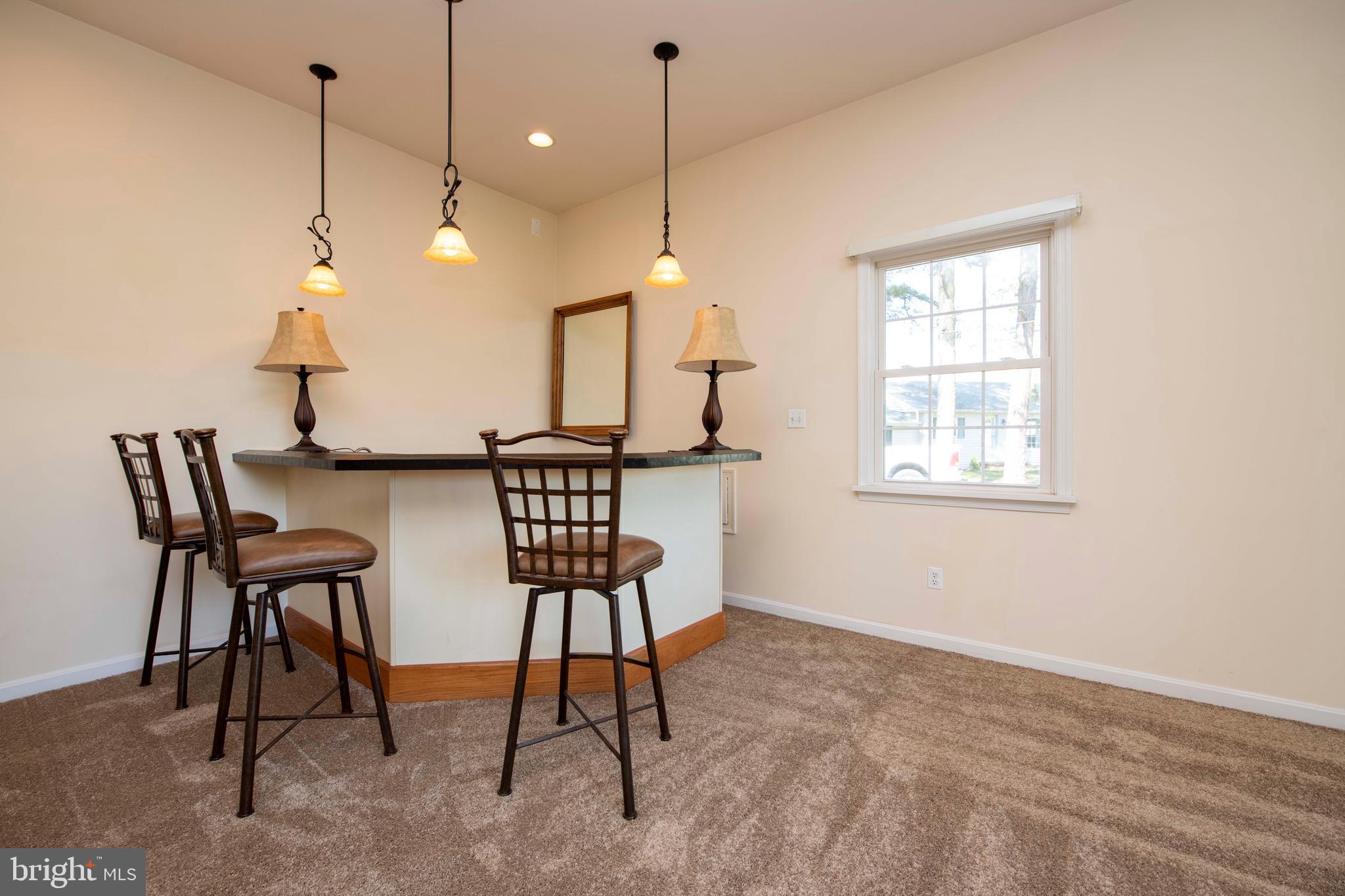 715 Kingfisher Road Deale, MD 20751 - Photo 27 of 53 Family room wet bar