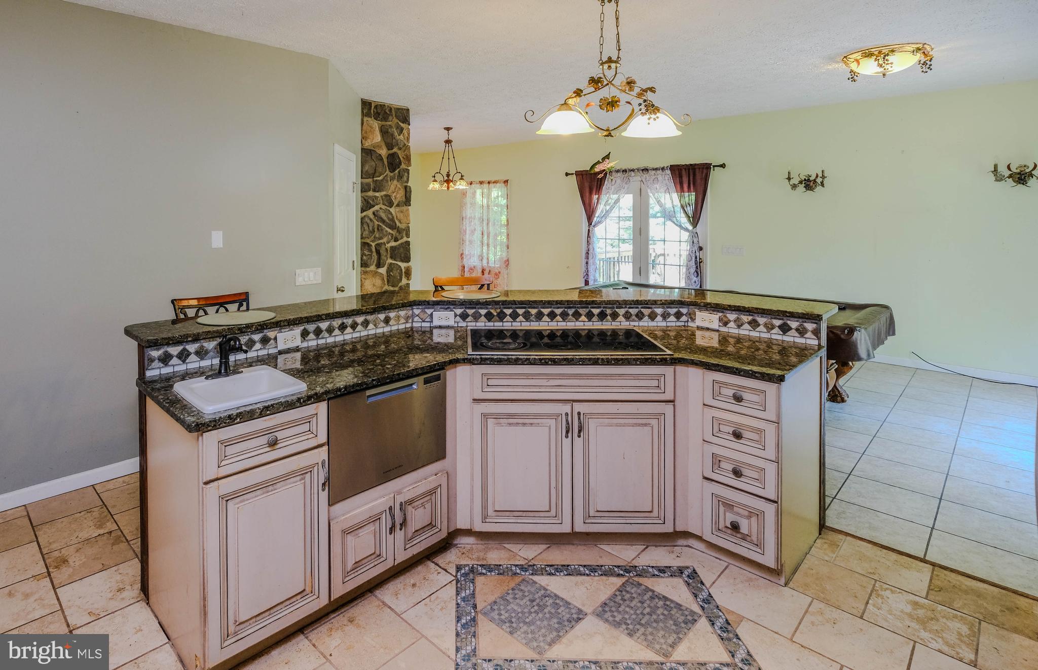 1195 Shangri-La Road Bentonville, VA 22610 - Photo 36 of 64 a view of a kitchen with stove and cabinets
