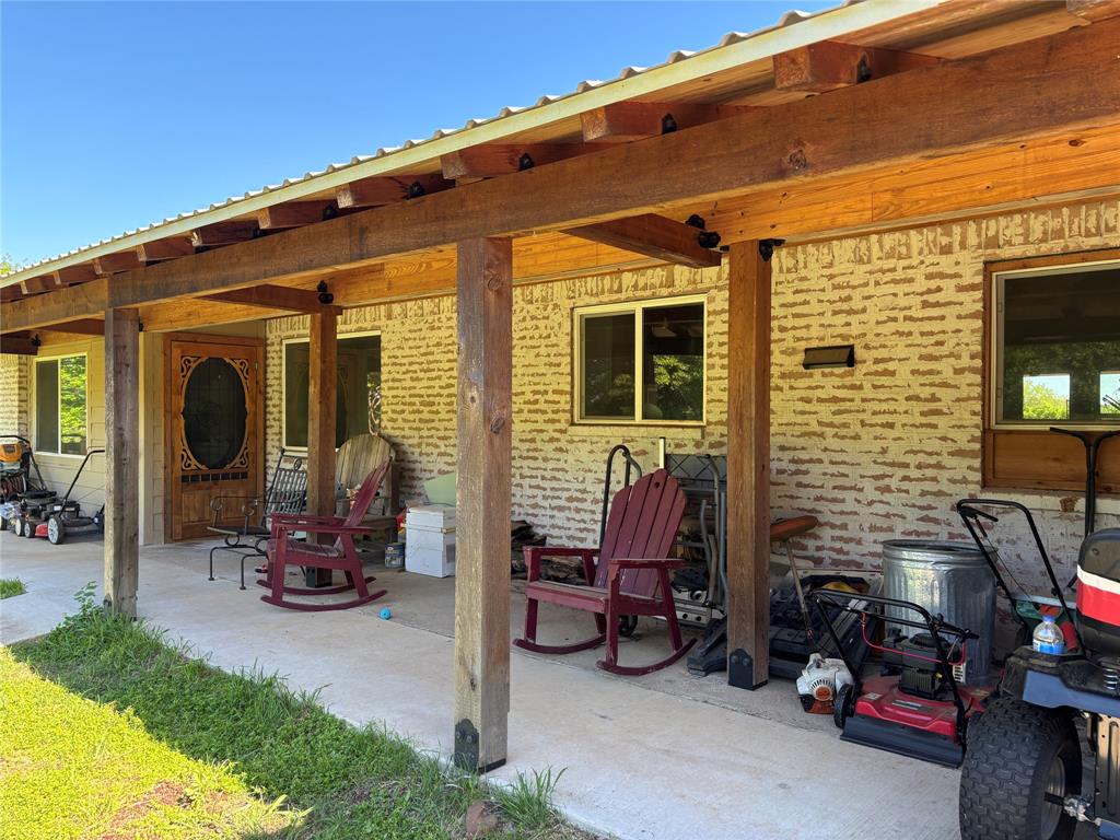 5355 Banks Road Fort Worth, TX 76140 - Photo 2 of 24 a view of a patio with table and chairs
