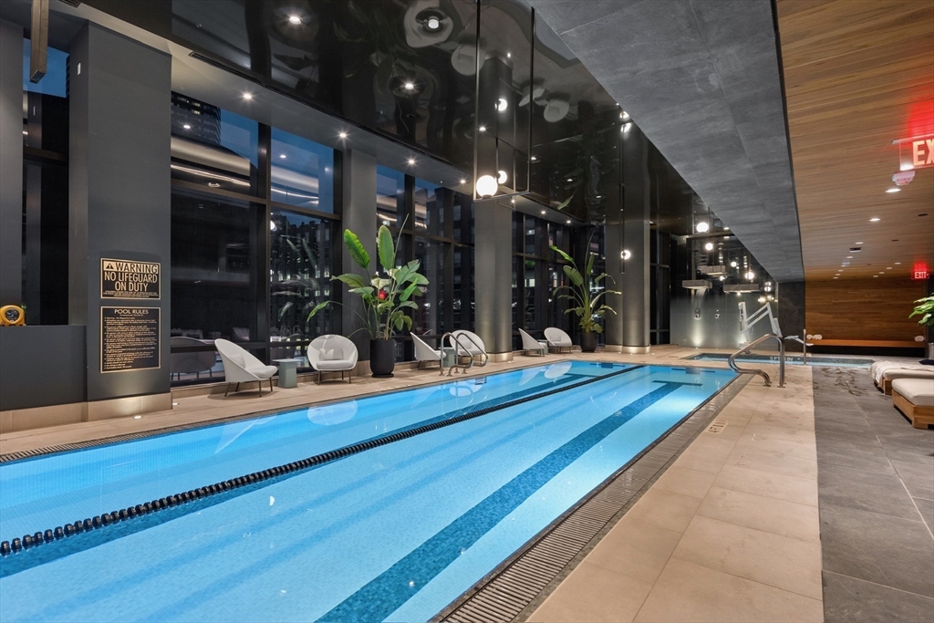 40 Trinity Place, Unit U25D Boston, MA 02116 - Photo 9 of 12 a view of a chairs and tables in patio