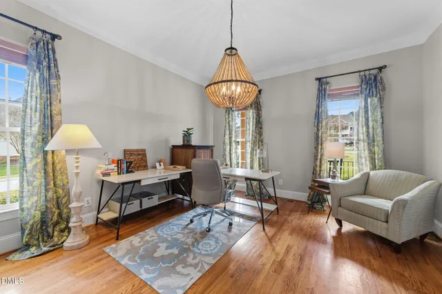 a bathroom with a mirror and a shower curtain