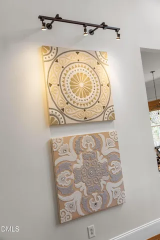 a kitchen with stainless steel appliances granite countertop a stove refrigerator and cabinets