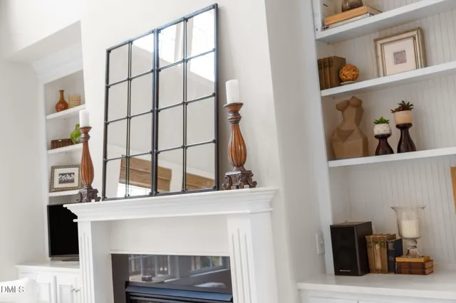 a bathroom with a toilet a sink and a mirror