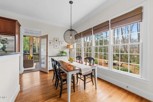 a bedroom with a bed and a television