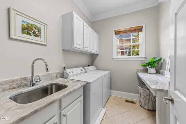 a spacious bathroom with a tub sink and mirror