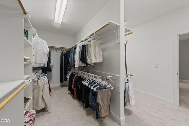 a bedroom with a bed and a view of bathroom