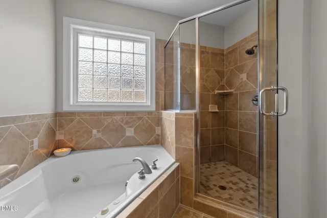 a view of a backyard with sitting area