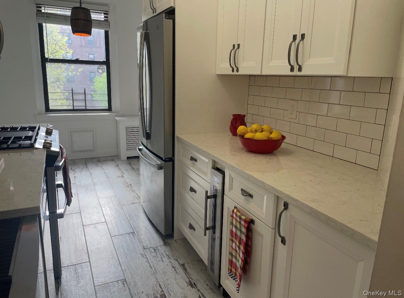 143 Garth Road, Unit 3L Scarsdale, NY 10583 - Photo 23 of 37 Newly renovated kitchen with new stainless steel appliances