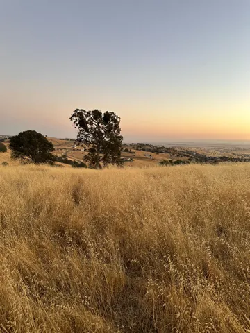 a view of ocean and a mountain