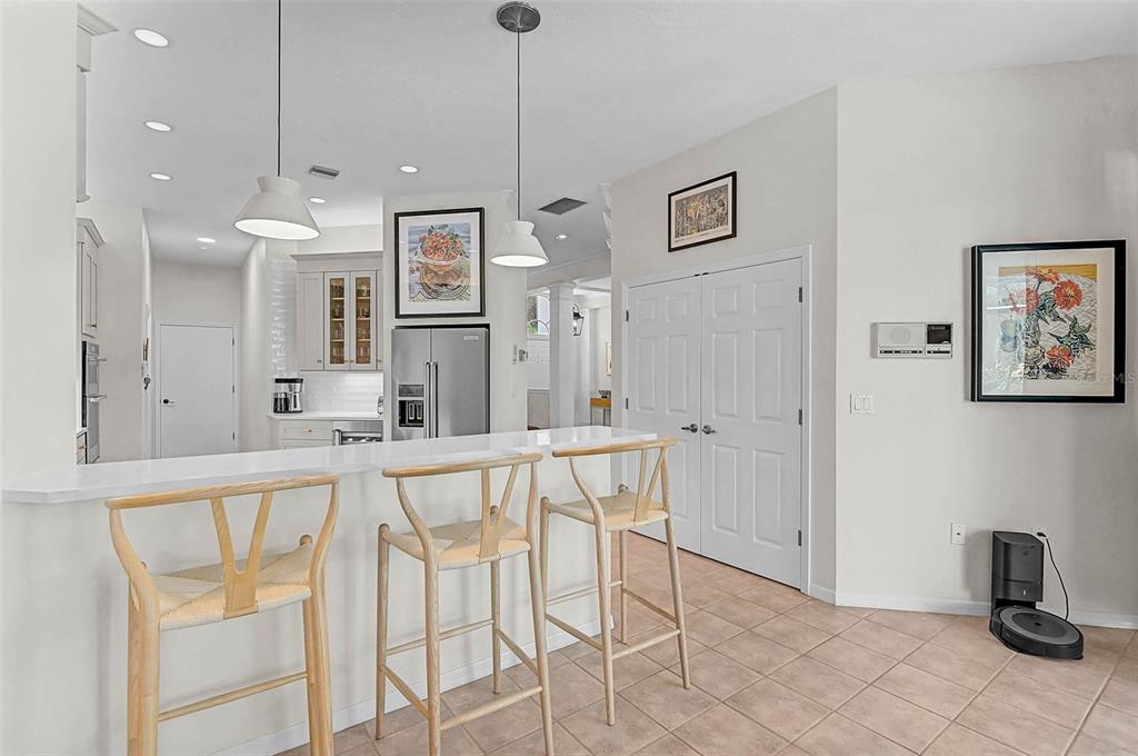 2050 Timucua Trail Nokomis, FL 34275 - Photo 14 of 50 a very nice looking dining room with a large window and chandelier