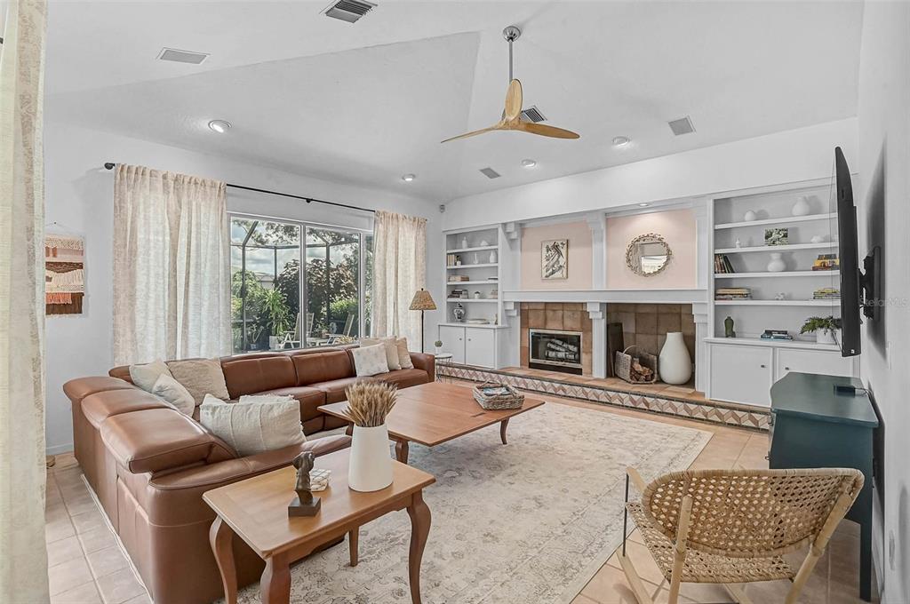 2050 Timucua Trail Nokomis, FL 34275 - Photo 17 of 50 a living room with furniture and a fireplace